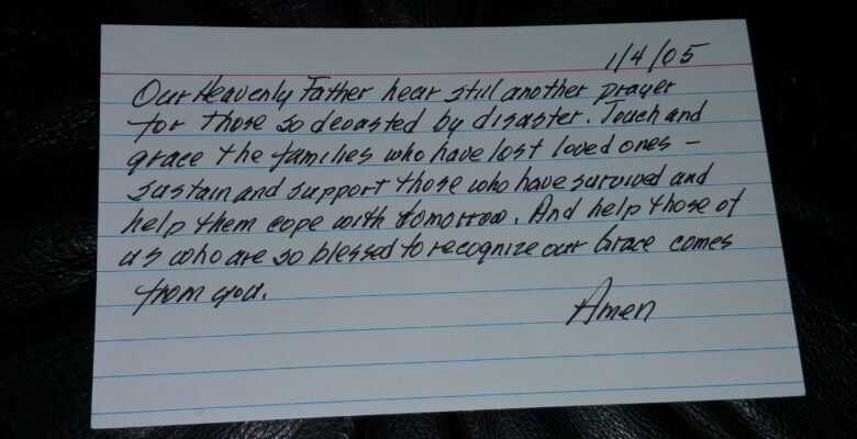 index card prayer on leather chair